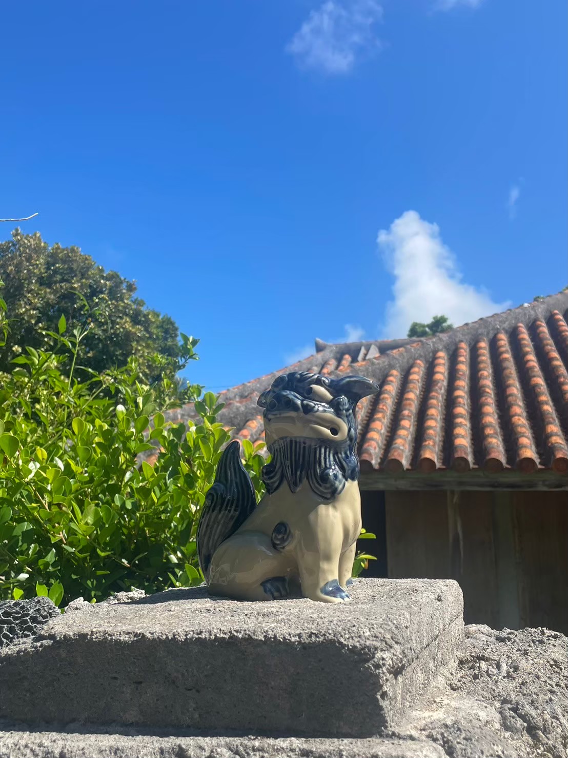 Traditional Okinawan shisa guardian along the day-trip route